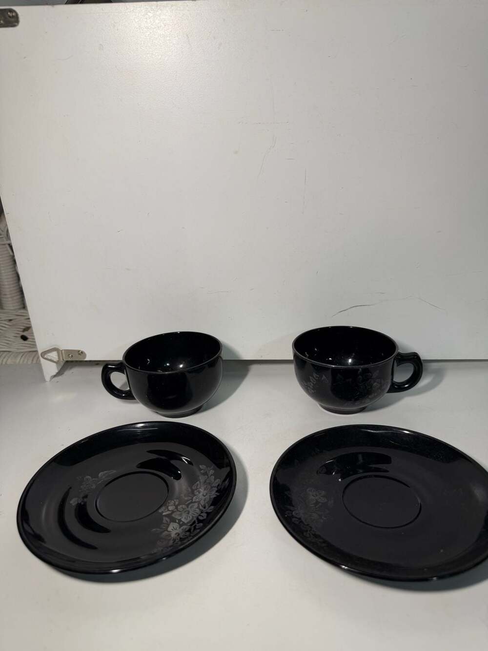 Vintage Black Glass Tea Cup and Saucer Set with Floral Sterling Silver Overlay